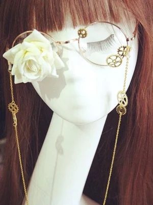Gothic steampunk lolita glasses with cream ivory rose flower and gold gear chains on mannequin wearing brown long hair wig, round metal frame design front view