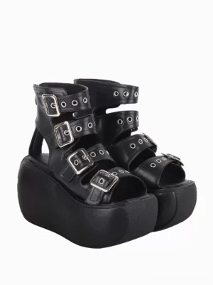 Pair of black punk lolita gladiator sandals side angle showcasing silver buckle hardware, perforated strap detailing, thick platform sole, and industrial aesthetic