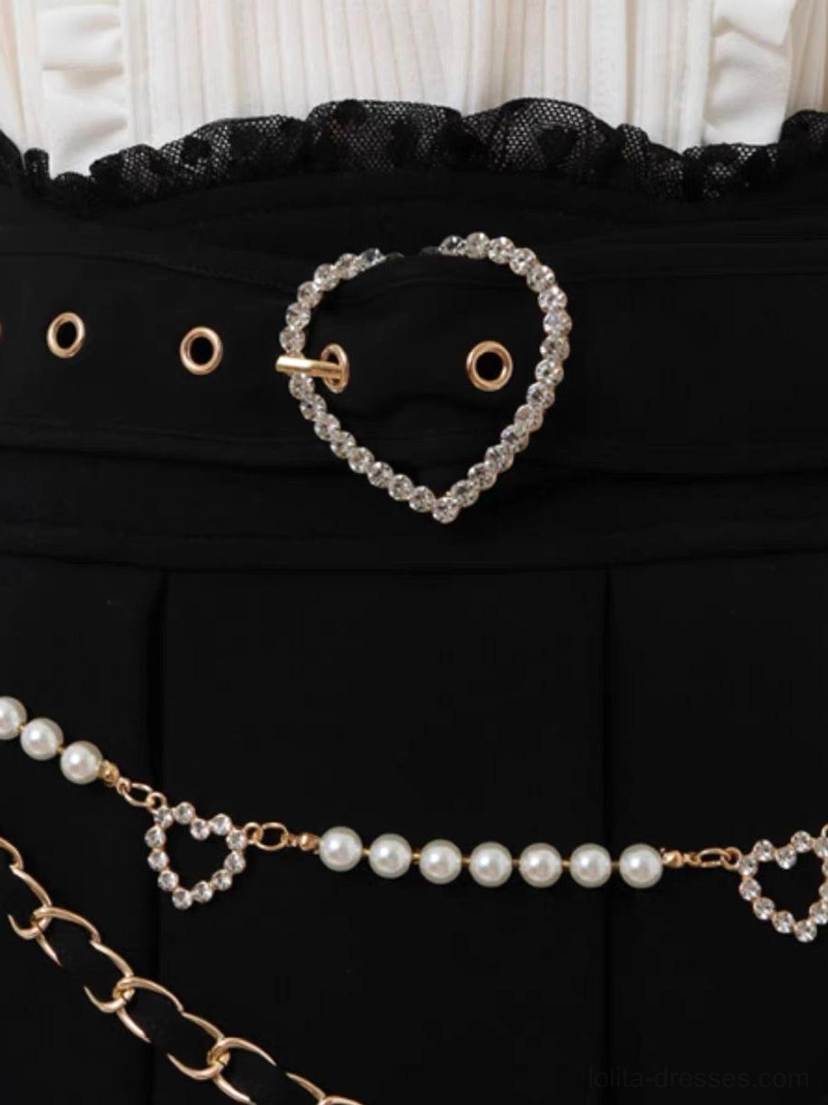 Steampunk lolita pleated skirt with white grommets, heart buckle decorations, and layered chain trim embellishments across multiple color options
