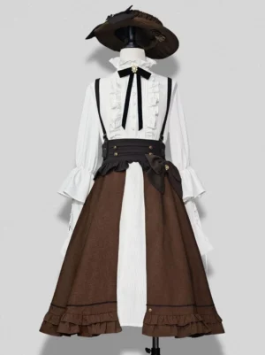 Steampunk Ouji Lolita suspender skirt in coffee brown with off-white and black ruffles, front view on dress form with vintage brown hat, showcasing cross-suspender design and bow sash details