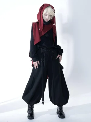 Black steampunk ouji lolita harem pants full front view with decorative buckles and drawstrings on blonde model wearing coordinated outfit