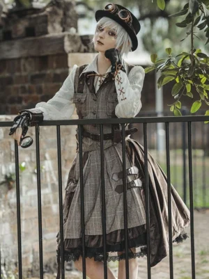 Steampunk Ouji cardigan three-quarter side view showing details with fingerless leather gloves and monocle accessory on androgynous model against industrial brick wall