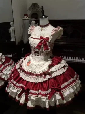 Sweet lolita strawberry dress gingham accents layered ruffled skirt decorative apron front angle