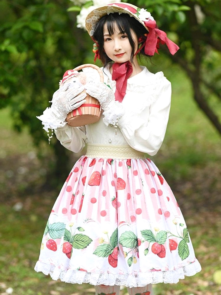 strawberry sweet lolita overskirt front full body view pink fruit print lace hem outdoor garden