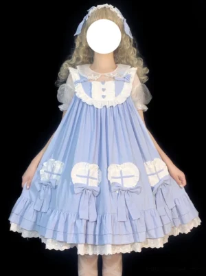 Blue-white sweet lolita jumper dress Alice in Wonderland style front view with heart-shaped bow appliques sheer puffed sleeves and ruffled lace hem on black background