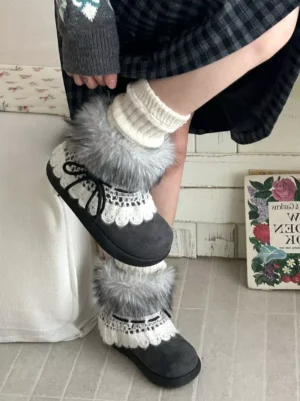 Model wearing grey lolita boots with scalloped lace trim and fluffy fur collar side view with plaid skirt and white socks
