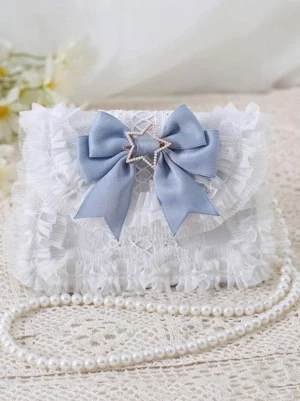 Baby blue sweet lolita crossbody bag with satin bow, pearl strap, and delicate lace embellishment, featuring star rhinestone accent