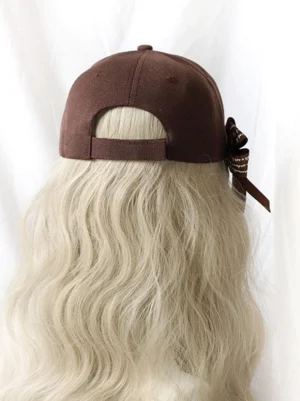 lolita headdress brown cap rear view with adjustable ribbon strap and round buckle closure detail