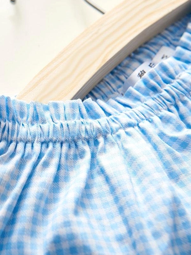 Sweet Lolita gingham bloomer waistband detail showing gathered elastic construction displayed on wooden hanger