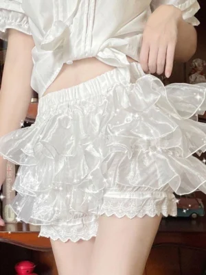 white lolita bloomer shorts front view with sheer layered organza ruffles and delicate lace leg hem