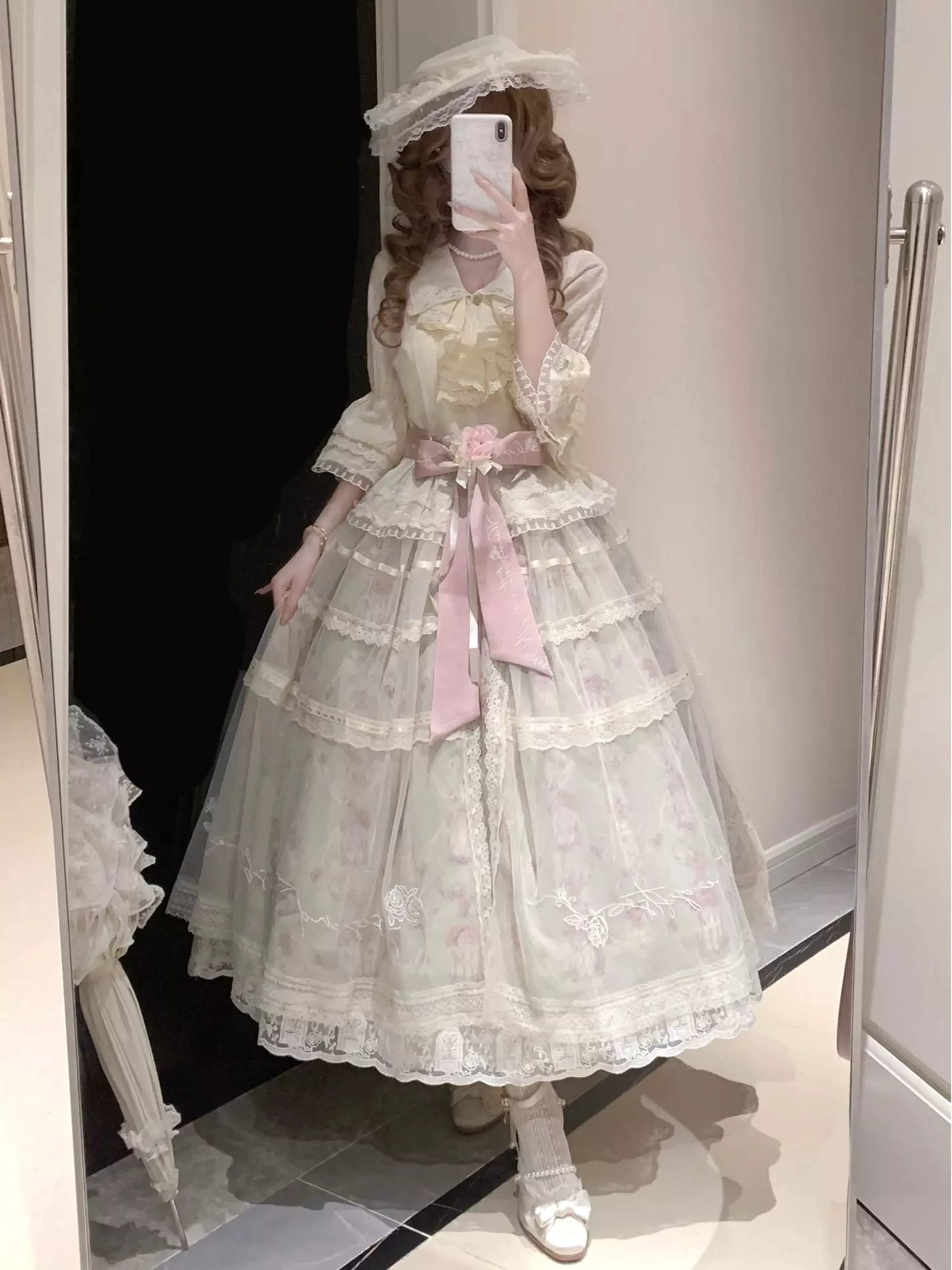 Separated lolita blouse cream floral print flared bell sleeves ruffled v-neck front bow detail flat lay