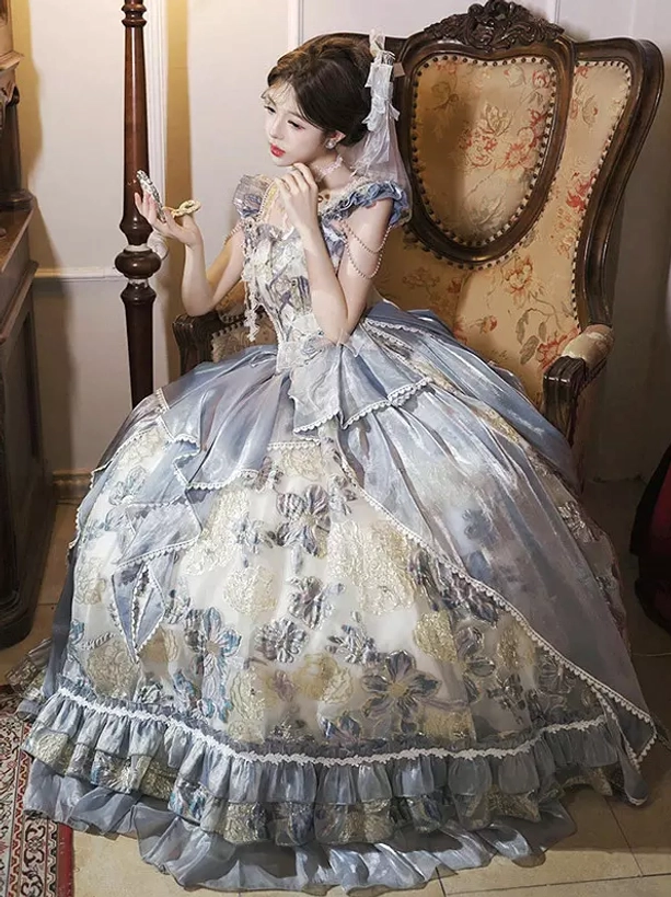 blue-lolita-fairy-gown-ruffled-spaghetti-straps-layered-tulle-skirt-seated-pose