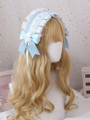 Sweet lolita blue lace headdress with pearl-beaded satin bows worn on blonde curly wig, side back view display against starry dreamy background