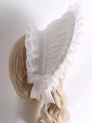 Lolita bonnet back view showing pleated cap construction large satin bow and lace-trimmed back detail