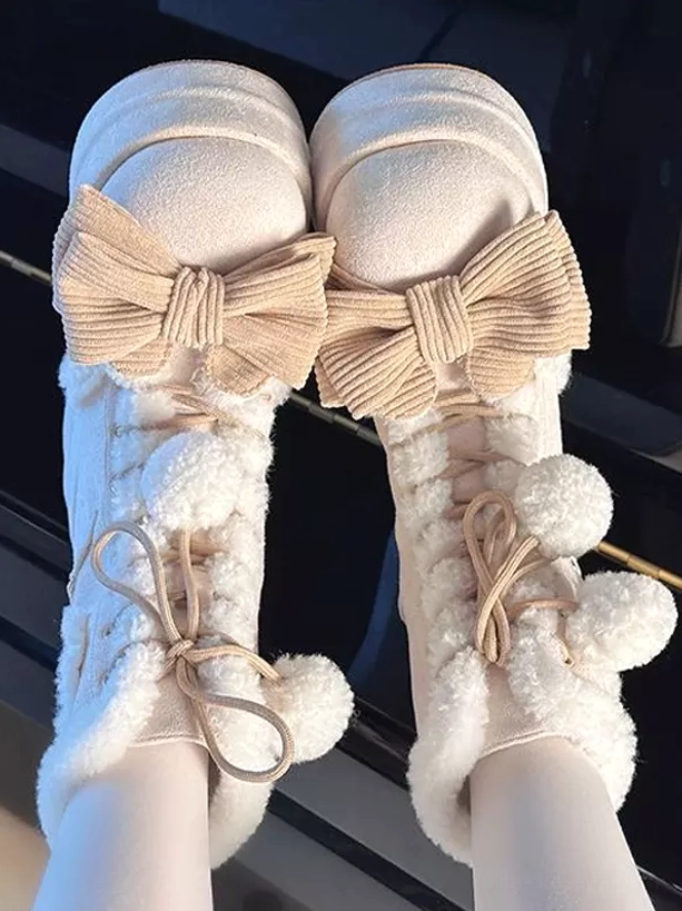 Khaki lolita platform boots on model feet top-down flat view khaki corduroy bows fluffy pom poms fuzzy trim collar