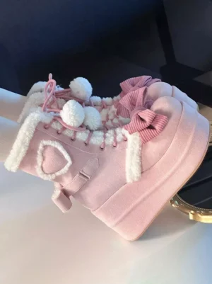 Sweet lolita platform boots micro suede pink side three-quarter view heart buckle fuzzy collar fluffy pom poms decorative bows