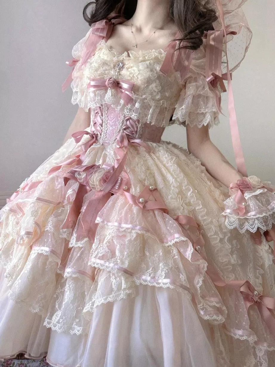 Sweet lolita bridal dress full ensemble with coordinating accessories oversleeves and headwear creating complete fairy tale bridal look
