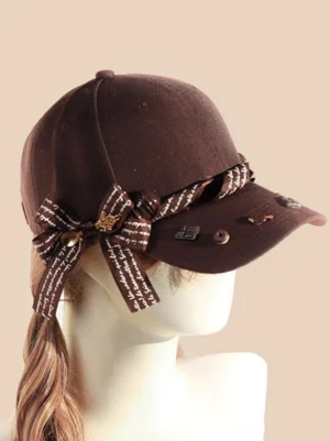 sweet lolita baseball cap deep brown ribbon bow side profile view with vintage charm embellishments on brim