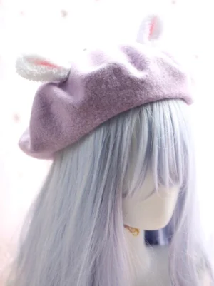 Light purple fuzzy wool sweet lolita bunny ear beret with white fluffy ears and pom-pom tail front view on mannequin lolita headdress