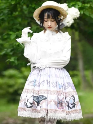 Sweet lolita butterfly skirt full-body front view with lavender print lace hem and white ruffled blouse worn by model in straw hat outdoor garden setting