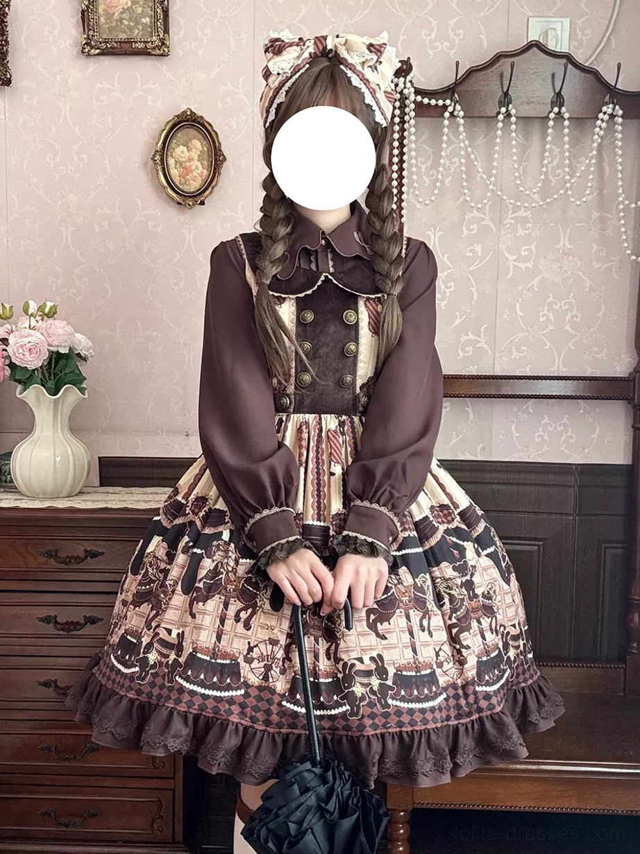 Sweet lolita jumper skirt front full body view with carousel print holding vintage handbag and matching hair bow accessories