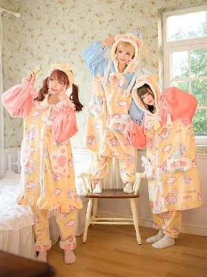 Sweet lolita cat pajama jumpsuit group styling on models showing yellow base with pink ruffled sleeves and cat ear hoods