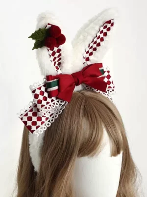 Sweet lolita Christmas rabbit ear headband side profile view on mannequin with brown straight wig, plaid pattern visible, fluffy ears with festive holly and red berry embellishments, lace-trimmed burgundy bow detail