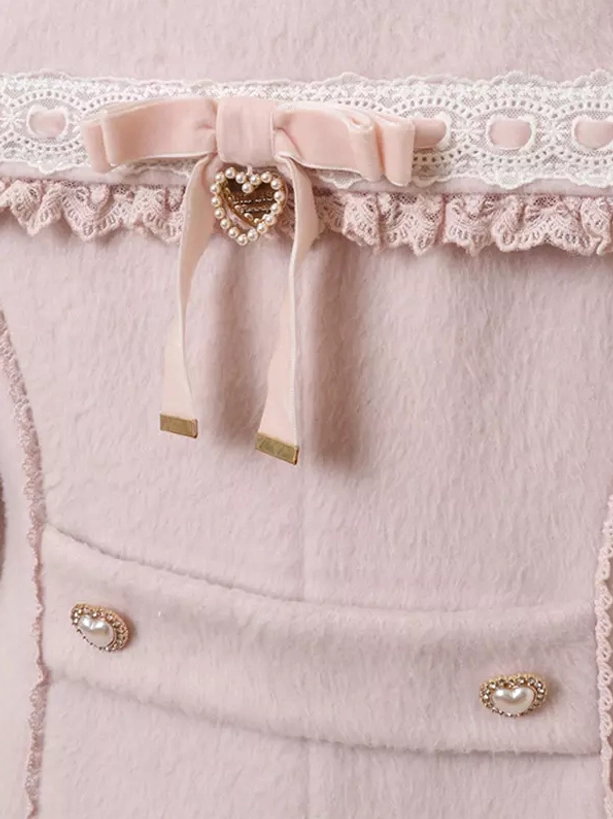Close-up of sweet lolita coat back waist velvet bow lace trim heart-shaped pearl pendant and heart-button details