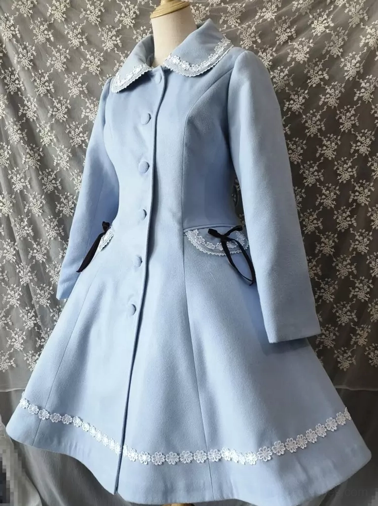 Lolita winter coat side profile medium shot displaying lace-trimmed collar detail, front button closure, black ribbon-adorned pocket, and lace hem