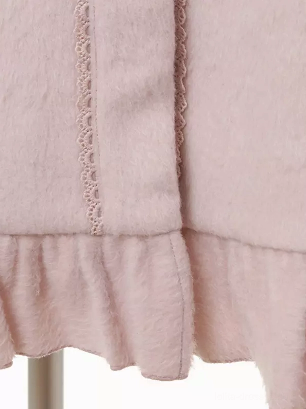 Close-up of sweet lolita coat delicate ruffled hem edge with subtle lace trim low-angle view