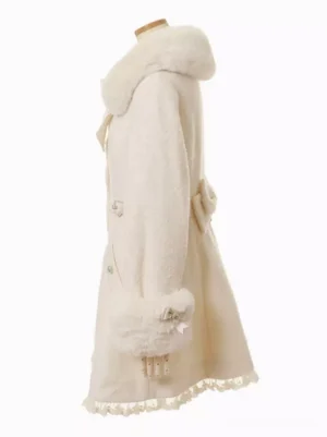 Sweet lolita princess coat right side perspective showing decorative tassel lace hem faux fur cuffs and elegant A-line cut detail