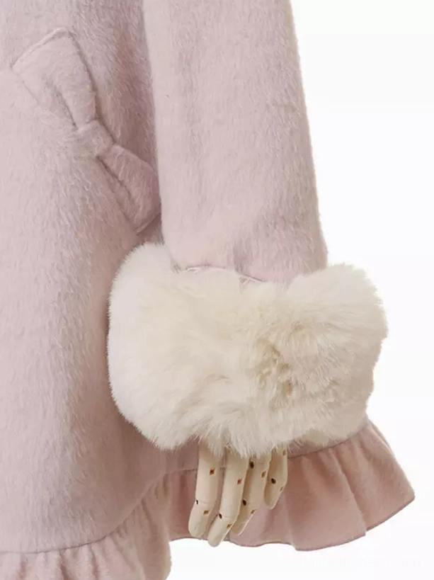 Close-up of sweet lolita wool coat long sleeve cuff showing white faux fur trim and ruffled sleeve edge with tiny bow accent