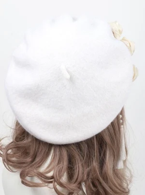 Back view of white Sweet Lolita beret with cream roses and tassel details, showing rear profile on mannequin, demonstrating how the Lolita headdress fits and positions from behind