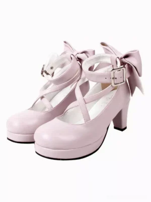Light pink Sweet Lolita cross-strap platform heels with adjustable ankle buckle and rear bow decoration on white background