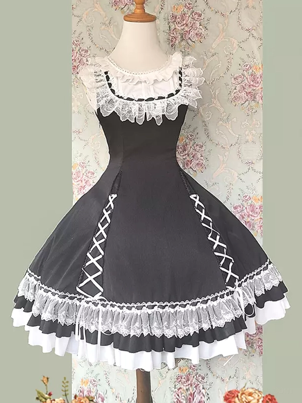 Back view of black sweet lolita dress showing back lace-up detail and cascading ruffled hem, sleeveless jumper dress rear display on dress form
