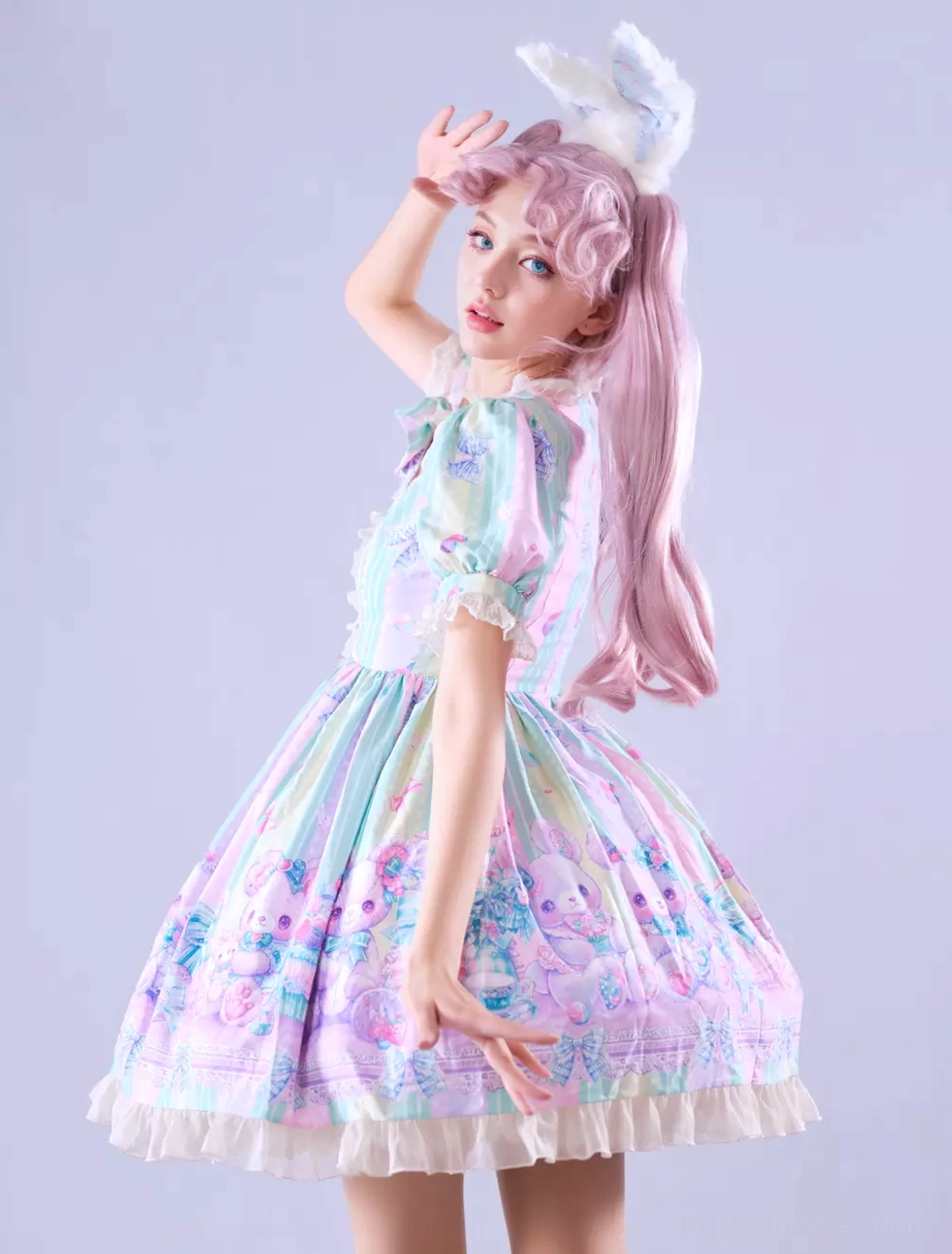 Sweet lolita dress closeup of cartoon floral hem print design, ruffled trim detail, and pastel color palette characteristic of sweet lolita aesthetic