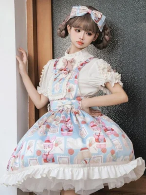 Sweet Lolita dress set featuring sky-blue printed skirt with ruffled trim and white stand-collar blouse, indoor doorway setting
