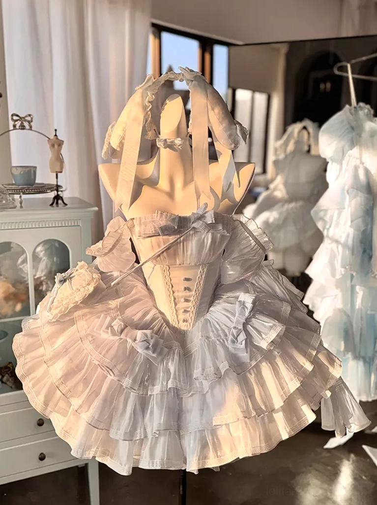Warm-toned sweet lolita dress front view with beige-white color palette, rabbit ear hair accessory, fitted corset bodice, and voluminous tiered ruffle skirt