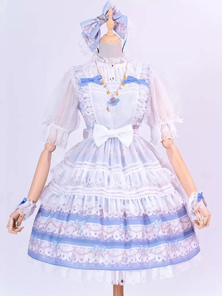 pastel blue sweet lolita dress front view on mannequin, showcasing front white bow decoration, sheer short puff sleeves, printed patterned skirt hem, and matching coordinating head bow accessory