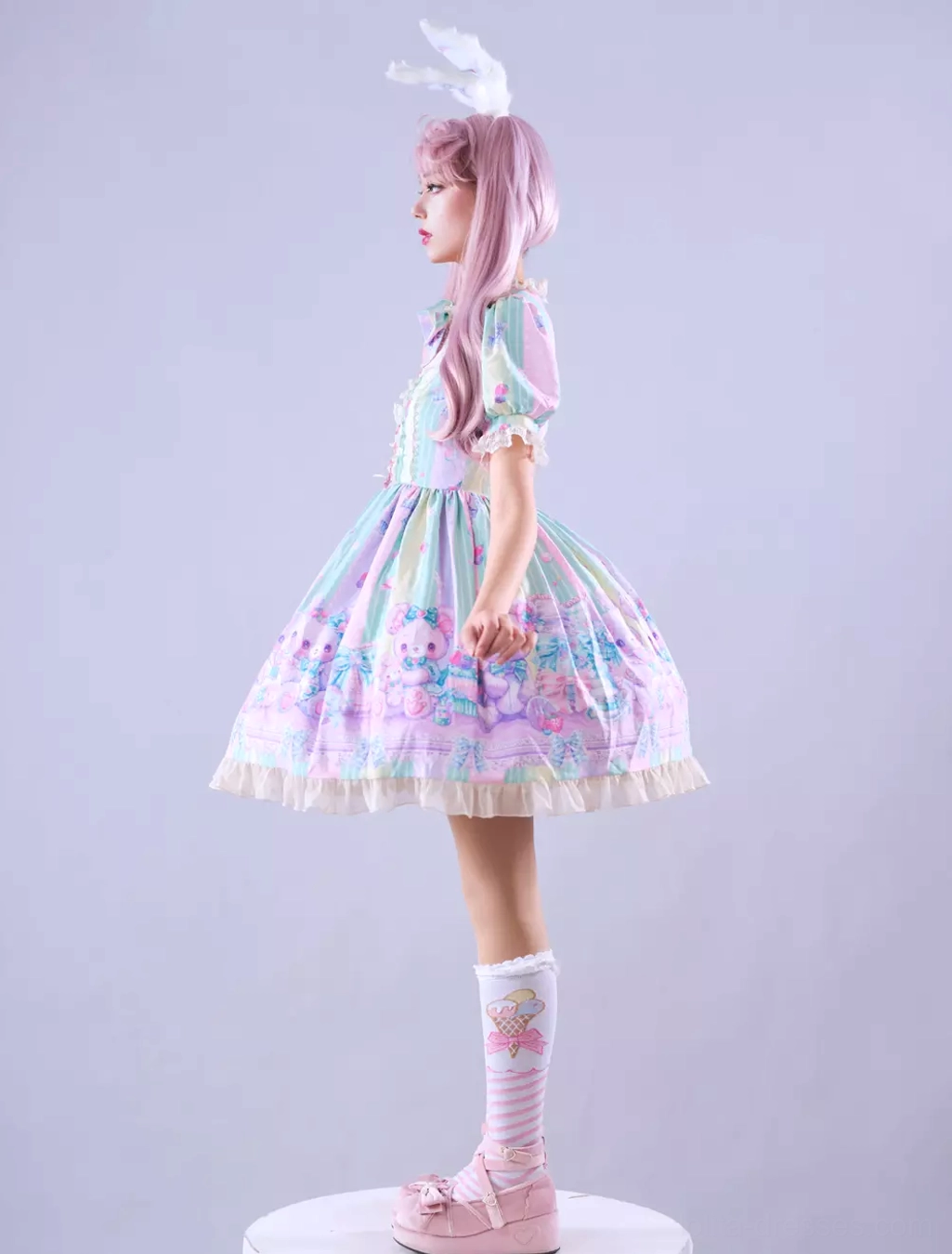 Sweet lolita dress lace-up bodice front closure detail showing adjustable lacing mechanism and coordinating bow accent
