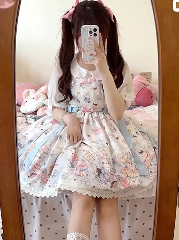 Sweet Lolita dress lower view lace hem ruffled collar white pastel color plush bed backdrop matching kawaii aesthetic