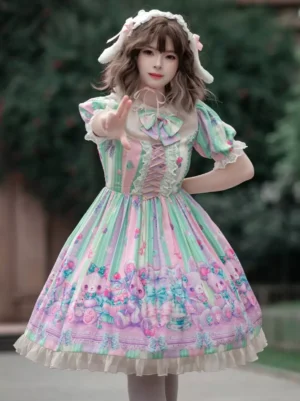 Sweet lolita dress front three-quarter view with pastel stripe print, cartoon floral hem, ruffled puff sleeves, and lace-up bodice worn with bunny ear hair accessory in outdoor park setting
