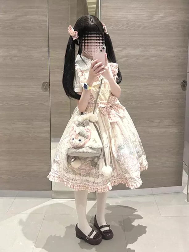 Sweet lolita dress featuring ruffled Peter Pan collar, white stockings, and puff sleeves shown in centered mirror selfie indoor setting
