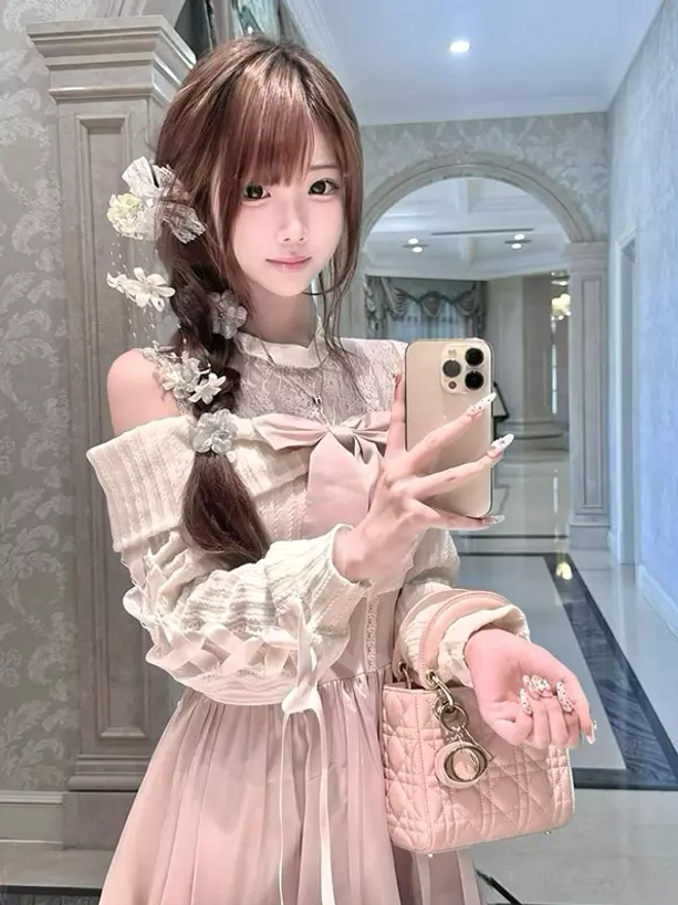 Sweet lolita off-shoulder dress set mirror selfie half-body view showing lace bodice and front bow details