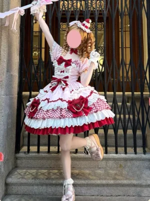 Side-front perspective of sweet lolita dress showing short puff sleeves, lace-up back details and ruffled gingham skirt panels