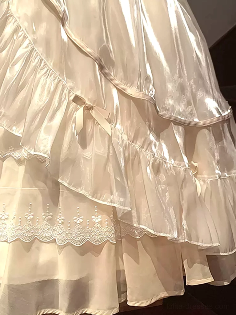 Sweet lolita dress organza ruffled skirt close-up side view shiny tiered layers satin bows embroidered lace trim hem details