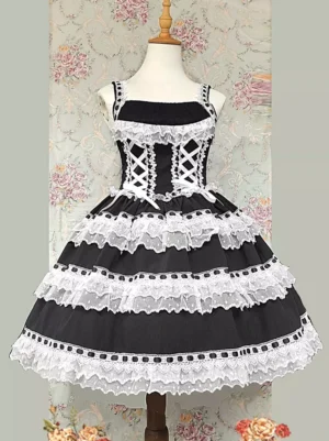 Sweet lolita dress front close-up detail showing square neckline crisscross lace front and layered lace ruffled skirt