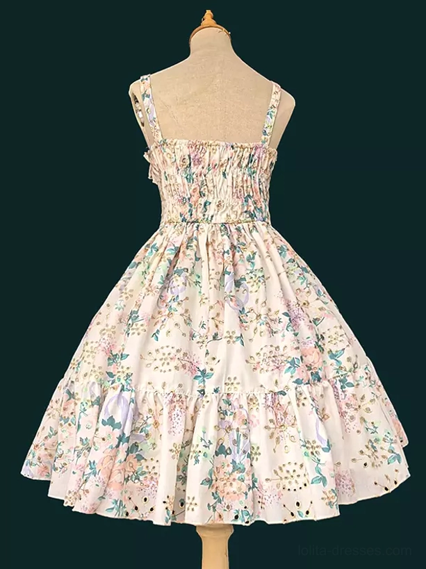 Sweet Lolita floral dress back view on dress form showing shirred back bodice spaghetti straps and ruffled hem pink floral print