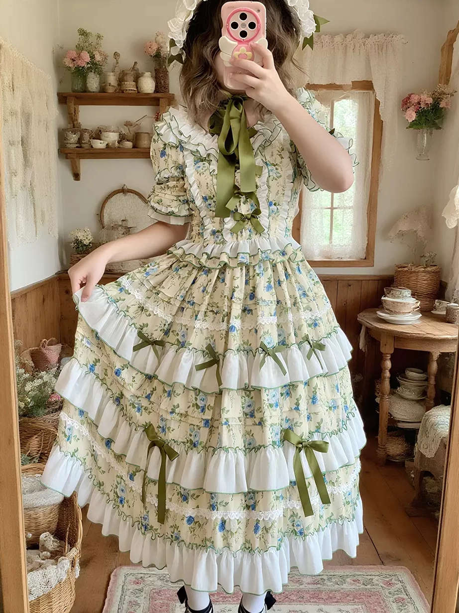Sweet lolita floral dress front view model wearing emerald ribbons tiered ruffled skirt mirror selfie vintage interior