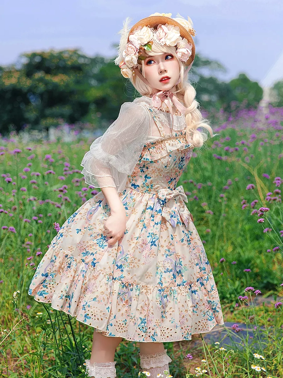 Model wearing sweet Lolita floral dress front full-body view loose curly hair flower crown ruffled knee socks outdoor flower field aesthetic